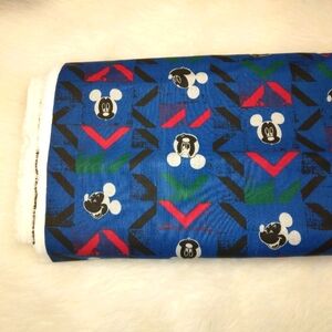 FABRIC Vintage Disney Mickey Mouse fabric on blue with abstract chevron,…